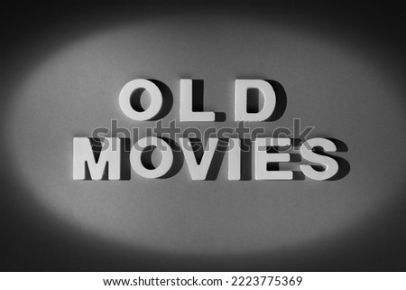 Old Movies - Vintage title style inscription. Black and white photograph