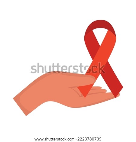 hand holding a hiv awareness red ribbon