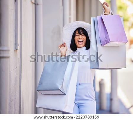 Woman, excited or fashion shopping bags on city street in Portugal for retail therapy, luxury store purchase or designer clothes sales. Portrait, smile or happy customer with gifts on road with style