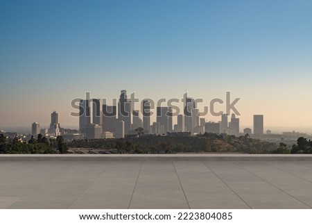 Skyscrapers Cityscape Downtown, Los Angeles Skyline Buildings. Beautiful Real Estate. Sunset. Empty rooftop View. Success concept. Royalty-Free Stock Photo #2223804085