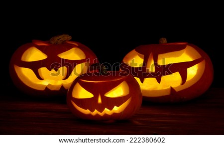 Scary halloween pumpkins  jack-o-lantern on black background