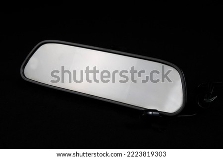 Mirror for the rear view camera.Rear view camera in a frame for a car license plate. Assistance in parking the car.