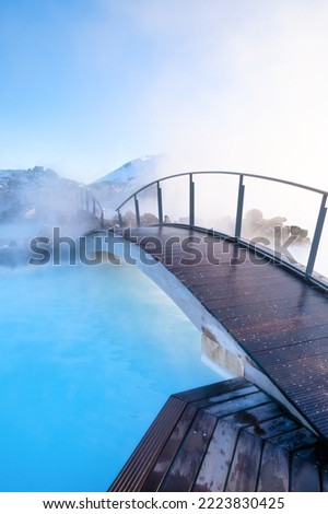 Blue Lagoon, Iceland. Geothermal spa for rest and relaxation in Iceland. Warm springs of natural origin. Blue lake and steam.  Royalty-Free Stock Photo #2223830425