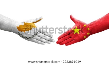 Handshake between China and Cyprus flags painted on hands, isolated transparent image.
