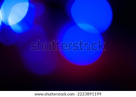 Blue bokeh background and different colored lights
