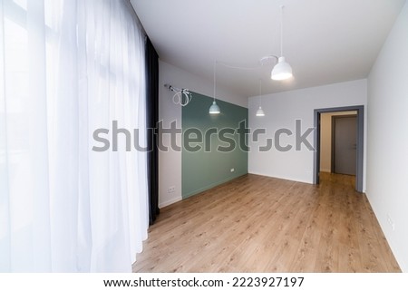 Bright, new, empty room with window and floor