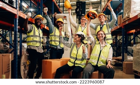 Professional warehouse worker team celebrating success in warehouse factory, Cheerful workers having fun at work, Happiness at job, Concept of success, Happy team enjoying their successful job Royalty-Free Stock Photo #2223960087