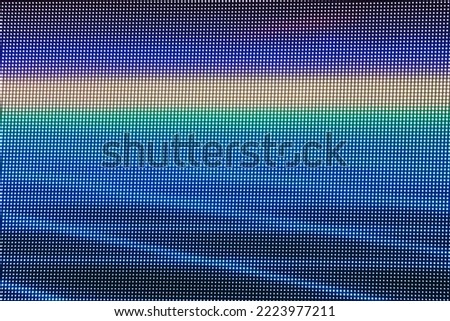 LED screen dots grid closeup colors
