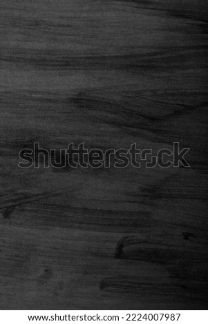 Texture of black painted background. Detail for design. Design elements. Macro. Full focus. Background for business cards, postcards and posters.