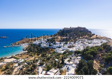Aerial panaoramic view. Lindos small and famous village. Rhodos Island at Aegean Sea. Greece. Tourism and vacations concept.