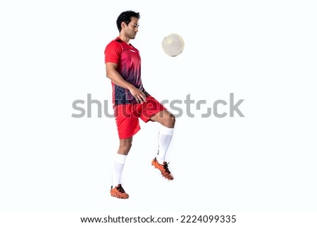 professional football player in red training uniform pose on a white background football concept Active and healthy lifestyle