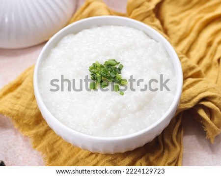 Chinese food, homemade rice congee for healthy breakfast. Selective focus Royalty-Free Stock Photo #2224129723