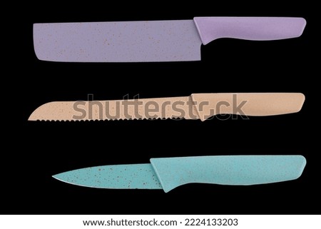 set of knives on a black background