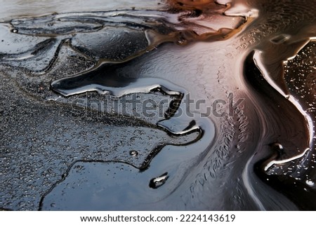 crude oil surface background textured Royalty-Free Stock Photo #2224143619