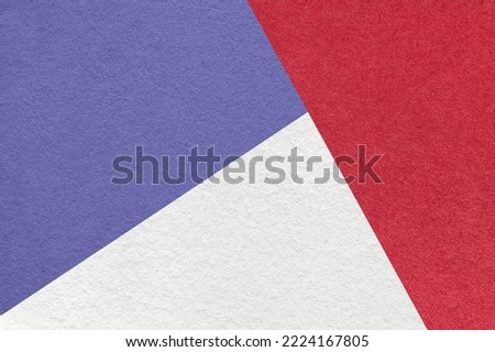 Texture of craft white, red and violet shade color paper background, macro. Structure of vintage wine abstract cardboard with geometric shape and gradient. Felt backdrop closeup.