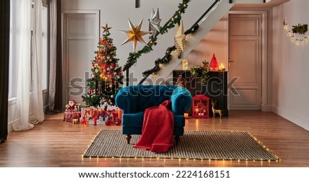 New year interior room concept with black fireplace, Christmas tree ornament, armchair and gift box style.