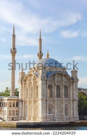 Istanbul, Turkey (Turkiye). Ortakoy Mosque on the banks of the Bosphorus on summer day. Amazing masterpiece of Ottoman baroque, XIX century. Turism or history of architecture concept Royalty-Free Stock Photo #2224204929