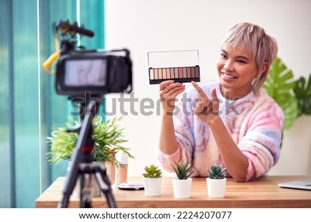 Female Vlogger Recording Beauty And Make Up Video At Home With Camera