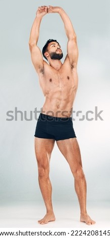 Body, man with muscle and strong for fitness and wellness, pose in underwear for health and exercise motivation with studio background. Healthy, workout and body care with bodybuilding mockup. Royalty-Free Stock Photo #2224208145