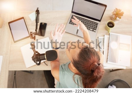 Top view, podcast microphone and woman on laptop recording audio for live streaming mockup. Presenter, host and female influencer on mic for talk show broadcast, radio or talking to online audience.