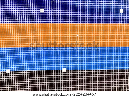 Pixel-like mosaic on a wall,  Spain- stock photo