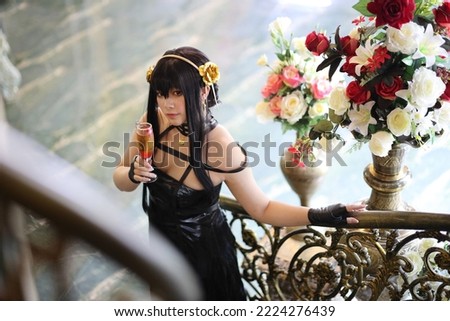 Portrait of a beautiful young woman Cosplay with Spy dress