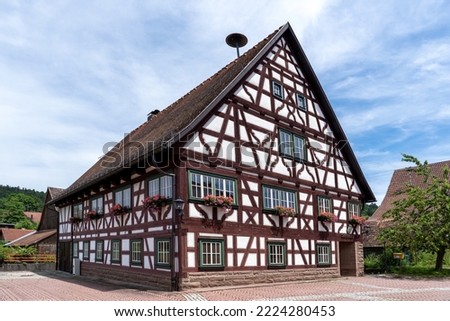 Beautiful romantic old half-timbered house - town hall in Trichtingen in municipality of Epfendorf, Baden-Württemberg, Germany Royalty-Free Stock Photo #2224280453
