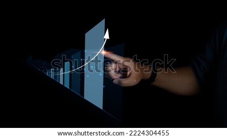 Stock Market Investments analysis and Digital Assets. Business finance technology and investment concept. Stock market graph with man touching stock trading screen background.