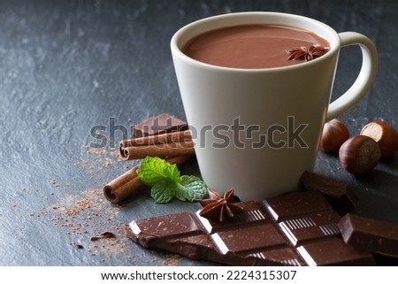 Hot chocolate in cup with additives