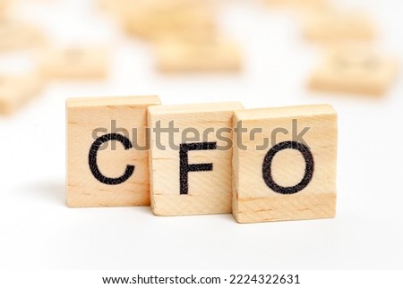 CFO text on wooden cube blocks. Financial business concept. CFO - Chief financial officer