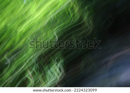 Blurred green light streaks used as background