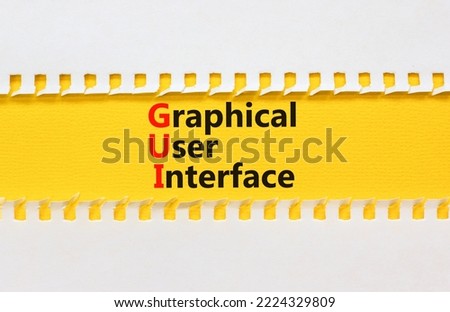 GUI graphical user interface symbol. Concept words GUI graphical user interface on yellow paper on a beautiful white background. Business and GUI graphical user interface concept. Copy space.