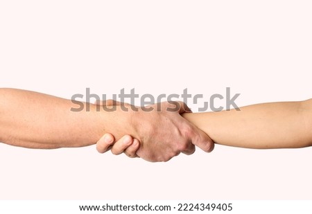 Man and woman hands holding each other, close-up. Two hands touching isolated on white background Royalty-Free Stock Photo #2224349405