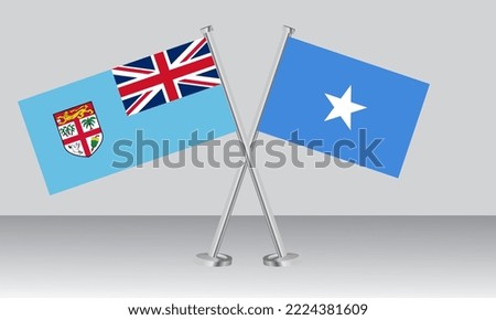 Crossed flags of Fiji and Somalia. Official colors. Correct proportion. Banner design