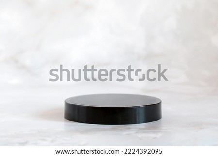 black podium, pedestal for mounting your product. background, mockup, scene creator, copy space. Royalty-Free Stock Photo #2224392095