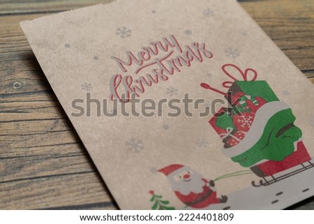 Christmas design of Santa Claus on wooden background and Merry Christmas