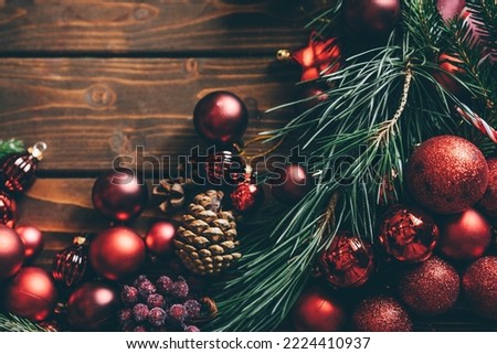Top view Christmas decoration on wooden background with copy space.