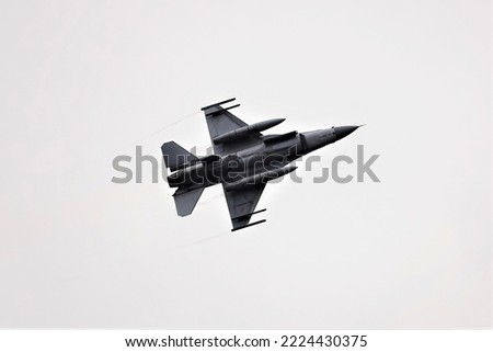                   F-16  fighter jet in flight              Royalty-Free Stock Photo #2224430375