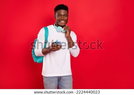 Photo of positive guy use gadget web app lesson lecture wear long sleeve shirt isolated shine color background