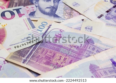 Paper banknotes of Georgia. 100 GEL. Cash Georgian money. One hundred lari. Currency exchange concept. Money to pay for purchases, credit, mortgage, debt, tax. Immigration and relocation. Payment