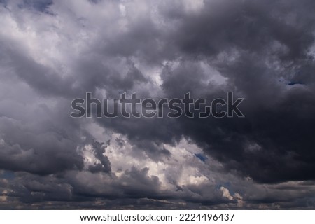 Epic Dramatic Storm sky, dark grey clouds background texture, thunderstorm