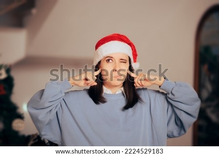 
Stressed Woman Covering Her Ears Tired of Christmas Songs. Neighbor annoyed by loud xmas party upstairs
 Royalty-Free Stock Photo #2224529183