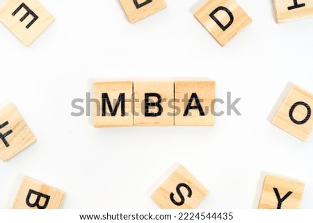 Wooden Blocks with text MBA. MBA - master of business administration. Business, business management concept