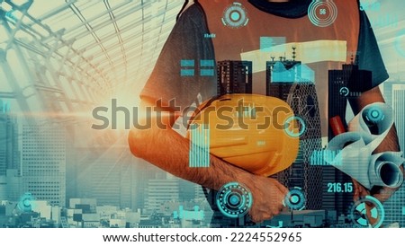 Future building construction and inventive engineering project concept with HUD hologram graphic design. Building engineer, architect people or construction worker works with modern civil technology.