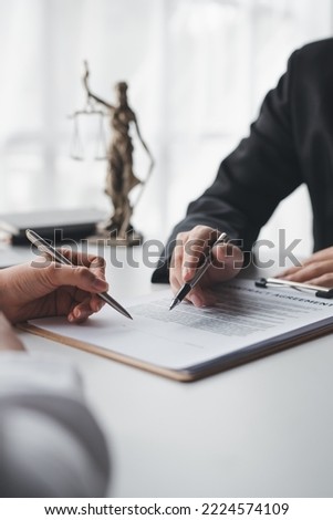 Sign an agreement the concept of legal proceedings and litigation. The Legal Execution Department signed a contract with the debtor to acknowledge the new agreement. Royalty-Free Stock Photo #2224574109