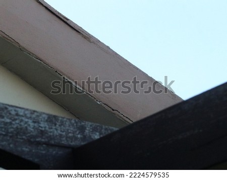  View of the triangular wooden roof from below