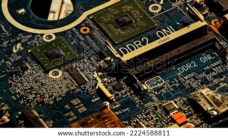 The motherboard of the laptop in disassembled form, with the withdrawn RAM. On the board you can see dust and traces of extrapolization. Author's signs on microcircuits are deleted.