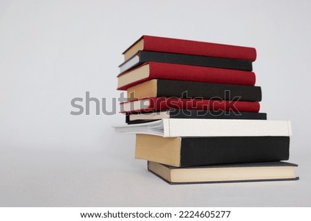 Stack of books on white background library school 