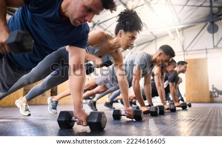 Strong, fitness and gym people with dumbbell teamwork training or exercise community, accountability and group. Sports diversity friends on floor in pushup muscle workout, power and wellness together Royalty-Free Stock Photo #2224616605
