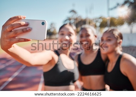 Sports, women and selfie with runner group at a running track for fitness, training and workout outdoors. Friends, phone and girl athlete team bond, smile and take picture at a stadium for exercise